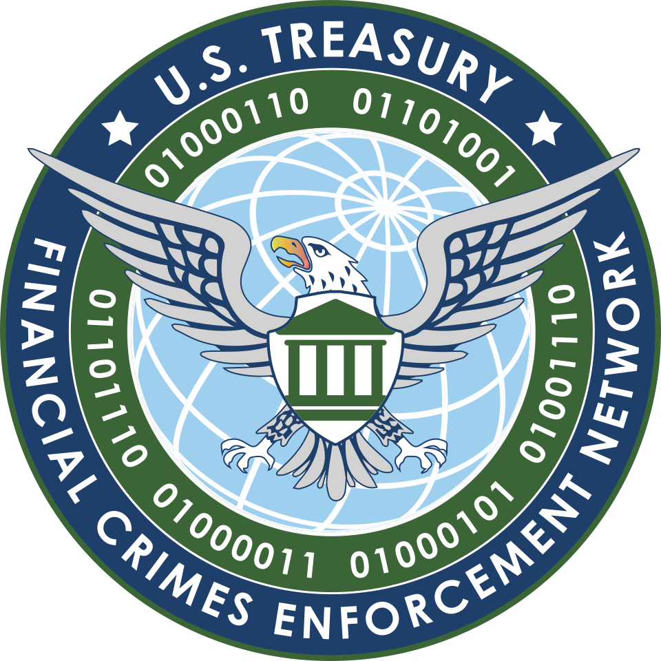 Insignia of the US Financial Crimes Enforcement Network (FinCEN) featuring globe, eagle, shield, and silhouette of a bank portico as well as binary digits representing the text "FinCEN" in ASCII.